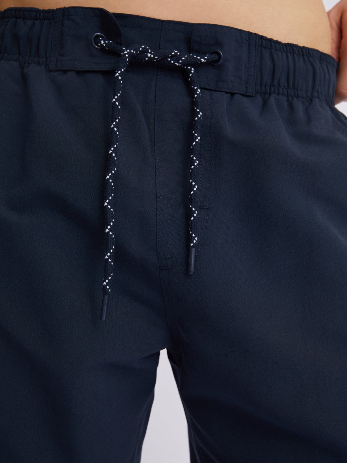 Плавательные шорты на резинке с карманами карго